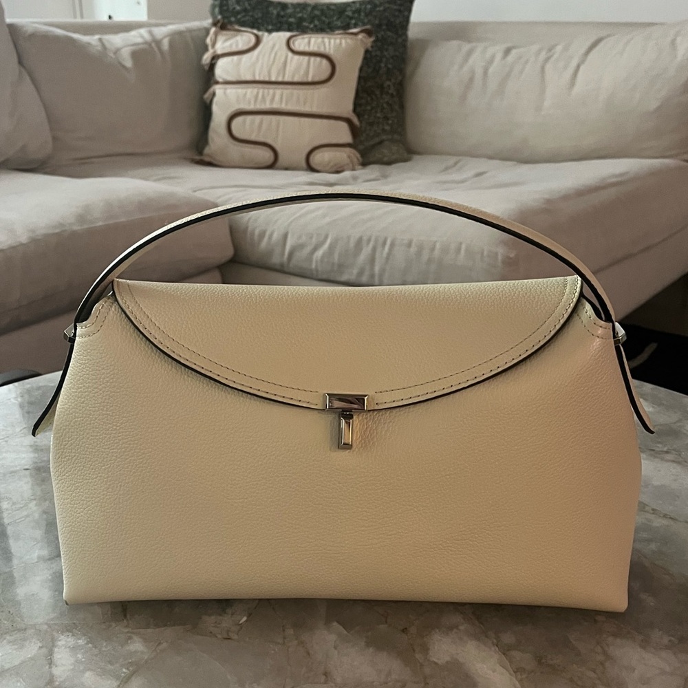 TOTEME T-lock textured leather milk grain handbag